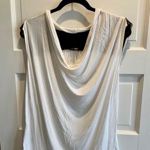 White blouse and leather on back like new express